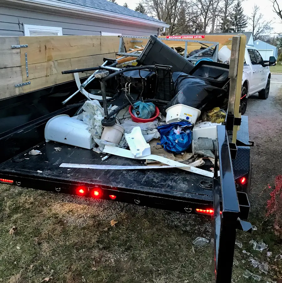 Roll-off dumpster delivered to a residential driveway in Zebulon